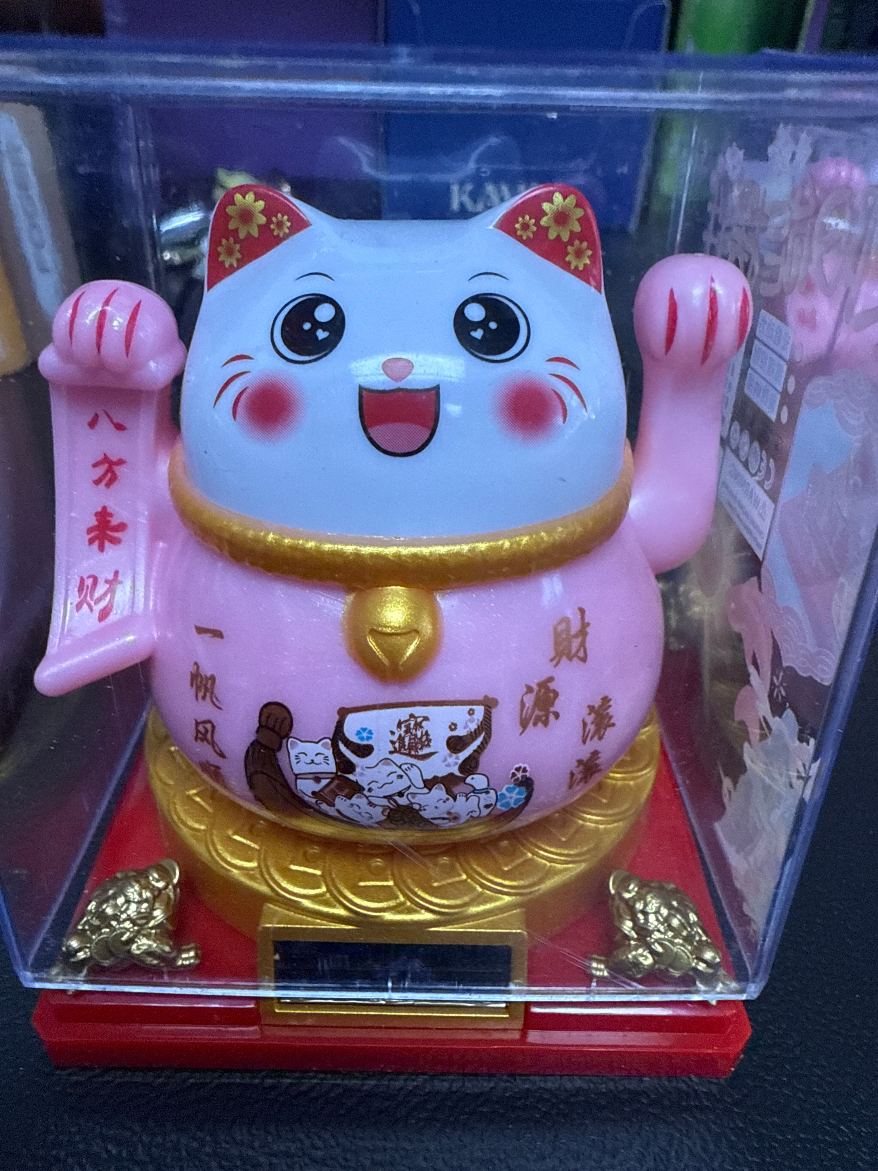 Chubby pink lucky cat