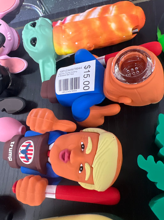 Silicone Trump Holding a Basball Bat Pipe